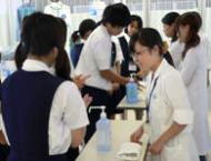 All participants doing hand hygiene with quick-drying hand antiseptic.